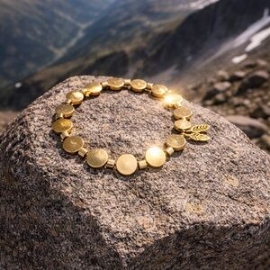 Elegant Gold Bracelet with Leaf Charm